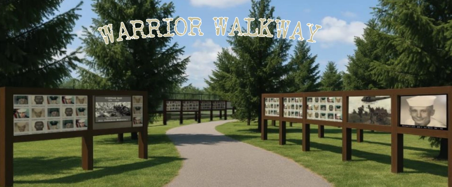 The ‘Warrior Walkway’ begins at the far corner of Parking Lot